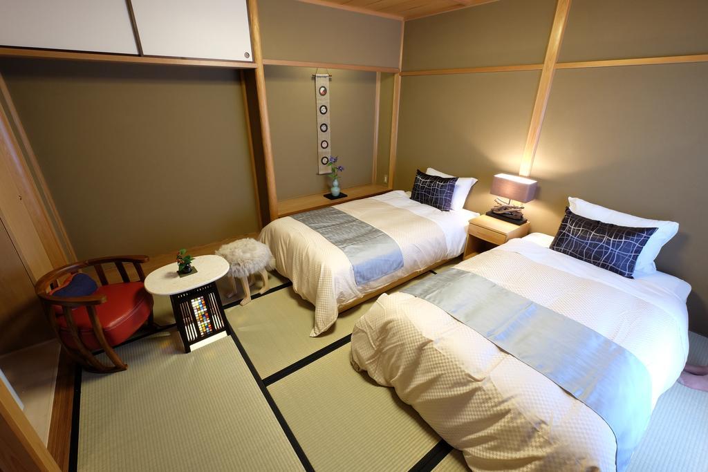 Miyagawacho Yoshii Hotel Киото Стая снимка