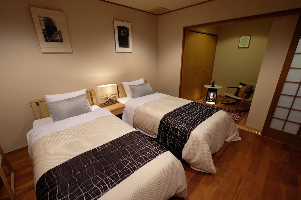 Miyagawacho Yoshii Hotel Киото Стая снимка